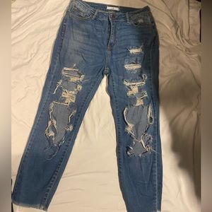 Worn in jeans with holes. Size 7/28